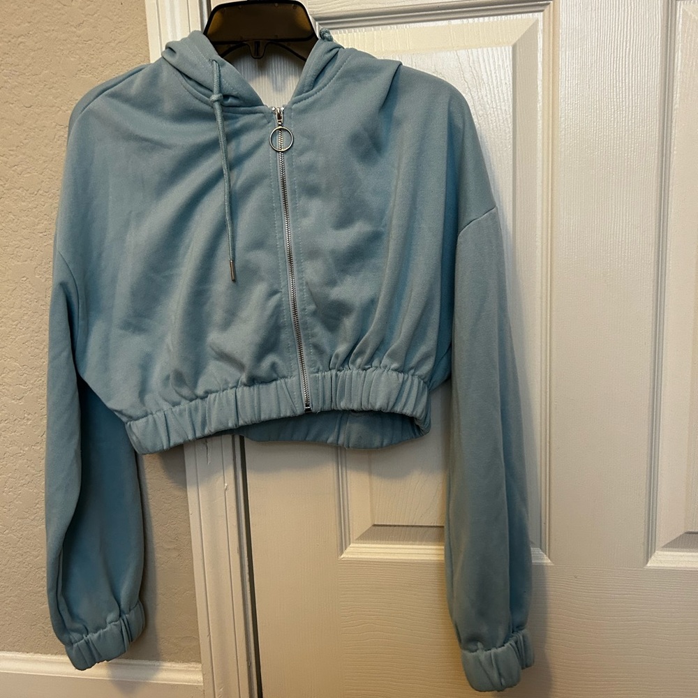 27. Baby blue SHEIN cropped zip up hoodie